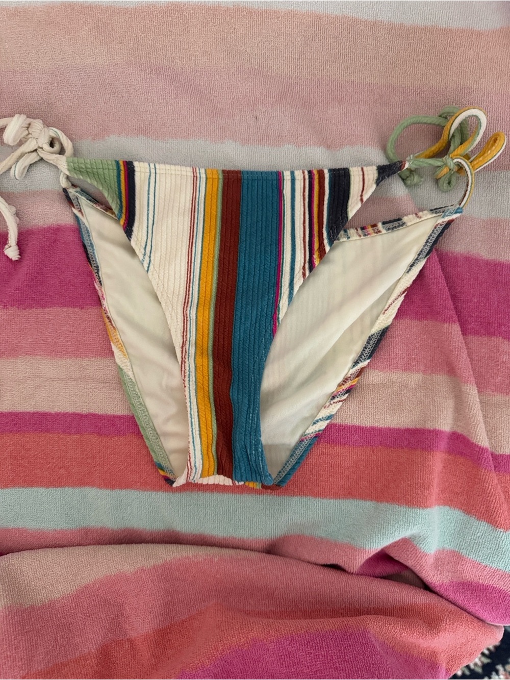 O'Neill Ribbed Striped Knit Bikini Bottom in Cream, Blue, Rust and Mustard Gold.